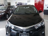 Toyota Corolla Q 2016 - Bán Toyota Corolla Q đời 2016, màu đen, giá 903tr giá 903 triệu tại Tp.HCM
