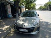 Mazda 3  AT 2014 - Chính chủ bán xe Mazda 3 AT đời 2014, màu ghi vàng, 630 triệu giá 630 triệu tại Bình Định