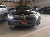 Toyota Camry E 2015 - Cần bán lại xe Toyota Camry E năm 2015, màu đen, giá chỉ 970 triệu giá 970 triệu tại Tp.HCM