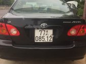 Toyota Corolla J 1.3 MT 2002 - Bán xe Toyota Corolla J 1.3 MT đời 2002, màu đen chính chủ giá 210 triệu tại Bình Định