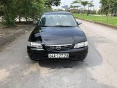 Mazda 626 2000 - Cần bán lại xe Mazda 626 2000, màu đen, giá chỉ 118 triệu giá 118 triệu tại Hải Dương
