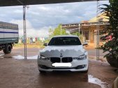 BMW 3 Series 320i 2014 - Cần bán gấp BMW 320i 2014, màu trắng, nhập khẩu   giá 1 tỷ 50 tr tại Lâm Đồng