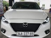 Mazda 3  AT 2015 - Cần bán Mazda 3 AT 2015, màu trắng, odo 5 vạn chuẩn giá 576 triệu tại Hải Phòng