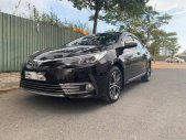 Toyota Corolla 1.8G 2018 - Cần bán Toyota Corolla 1.8G sản xuất năm 2018, màu đen giá 750 triệu tại Tp.HCM