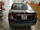 Daewoo Lacetti EX 2005 - Cần bán Daewoo Lacetti Ex đời 2005, màu đen, xe gia đình sử dụng nên rất giữ xe giá 160 triệu tại Thanh Hóa