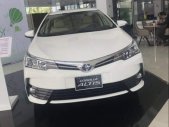 Toyota Corolla altis 2019 - Bán Toyota Corolla Altis năm sản xuất 2019, màu trắng, 700 triệu giá 700 triệu tại Tiền Giang