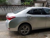 Toyota Corolla altis 1.8G 2015 - Cần bán Toyota Corolla Altis 1.8G đời 2015, màu bạc   giá 595 triệu tại Nam Định
