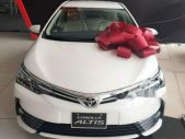 Toyota Corolla altis  1.8E  2019 - Cần bán xe Toyota Corolla Altis 1.8E 2019, màu trắng, 733 triệu giá 733 triệu tại Cần Thơ