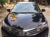 Toyota Corolla altis 1.8G AT 2014 - Bán ô tô Toyota Corolla altis 1.8G AT năm 2014, màu đen xe gia đình  giá 618 triệu tại Ninh Bình