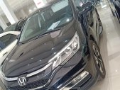 Honda CR V 2.4 2015 - Bán xe Honda CR V 2.4 AT sản xuất cuối 2015, bản full opition, màu đen, xe còn rất mới, rất đẹp giá 865 triệu tại Tp.HCM