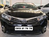 Toyota Corolla altis 2.0V 2014 - Cần bán lại xe Toyota Corolla altis 2.0V đời 2014, màu đen giá 690 triệu tại Tp.HCM