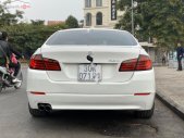 BMW 5 Series   2012 - Bán ô tô BMW 520i sản xuất 2012, màu trắng, xe nhập giá 975 triệu tại Hà Nội