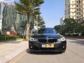 BMW 3 Series 328i GT 2014 - Cần bán BMW 3 Series 328i GT sản xuất năm 2014, màu đen, xe nhập giá 1 tỷ 150 tr tại Hà Nội