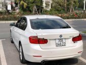 BMW 3 Series 2013 - Bán BMW 320i năm sản xuất 2013, màu trắng, xe nhập giá 750 triệu tại Hà Nội