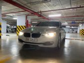 BMW 3 Series   2014 - Cần bán lại xe BMW 320i sản xuất 2014, màu trắng, xe nhập, giá 750tr giá 750 triệu tại Hà Nội