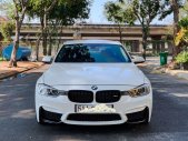 BMW 3 Series 2014 - Cần bán xe BMW 3 Series sản xuất 2014, màu trắng, nhập khẩu nguyên chiếc giá cạnh tranh giá 920 triệu tại Tp.HCM