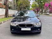 BMW 3 Series 2016 - Cần bán BMW 3 Series 320i sản xuất năm 2016, màu đen giá 1 tỷ 39 tr tại Tp.HCM