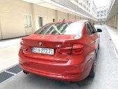 BMW 3 Series 2015 - Cần bán xe BMW 3 Series 320i sản xuất 2015, màu đỏ, giá 980tr giá 980 triệu tại Tp.HCM