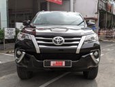 Toyota Fortuner G 2019 - Cần bán Toyota Fortuner G đời 2019, màu đen lướt 9.000km siêu mới. Giá cực sốc giá 950 triệu tại Tp.HCM