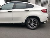 BMW X6 2009 - Chính chủ cần bán xe BMW X6 3,5AT 2009 màu trắng, full option giá 660 triệu tại Tp.HCM