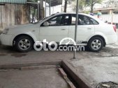Daewoo Lacetti   EX  2005 - Cần bán Daewoo Lacetti EX đời 2005, màu trắng, xe nhập giá 115 triệu tại Tiền Giang