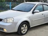 Daewoo Lacetti Max 2005 - Bán xe Daewoo Lacetti Max sản xuất năm 2005, màu bạc số sàn giá 125 triệu tại Hà Nội