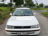 Toyota Corolla 1993 - Màu trắng, nhập khẩu nguyên chiếc giá 75 triệu tại Hà Nội