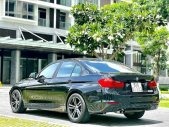 BMW 328i 2013 - Màu đen, nhập khẩu giá 689 triệu tại Hà Nội
