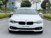 BMW 320i 2018 - Xe màu trắng giá 1 tỷ 60 tr tại Hà Nội
