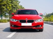 BMW 320i 2013 - Xe màu đỏ, xe nhập số tự động giá 750 triệu tại Hà Nội