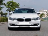 BMW 320i 2013 - Màu trắng, nhập khẩu số tự động giá 660 triệu tại Hà Nội