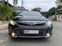 Toyota Camry 2.0E 2016 - Chính chủ cần bán xe Toyota Camry model 2016 , màu đen nội thất kem giá 639 triệu tại Tp.HCM
