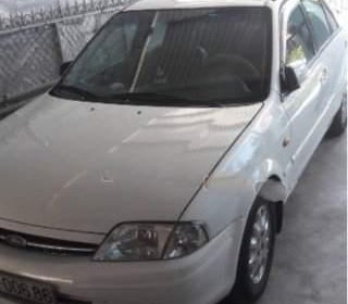 Ford Laser Deluxe 1.6 MT	 2001 - Chính chủ bán xe Ford Laser Deluxe 1.6 MT đời 2001, màu trắng