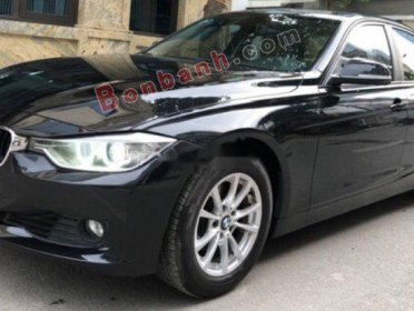 BMW 3 Series 320i 2012 - Cần bán xe BMW 320i sản xuất 2012, model 2013 màu đen