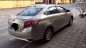 Toyota Vios 2014 - Chính chủ bán lại xe Toyota Vios đời 2014, màu vàng cát