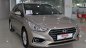 Hyundai Acent 1.4MT 2018 - Cần bán xe Hyundai Acent 1.4MT đời 2018 ghi vàng