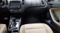 Kia Cerato 1.6 AT  2016 - Bán Kia Cerato 1.6 AT năm sản xuất 2016, màu đen, giá 580tr