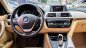 BMW 3 Series  320i   2016 - Bán BMW 320i năm 2016, màu đen, nhập khẩu 