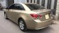 Chevrolet Cruze MT 2010 - Gia đình cần bán Cruze 2010, số sàn, màu vàng cát, gia đình sử dụng