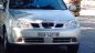 Daewoo Lacetti   2004 - Cần bán gấp xe cũ Daewoo Lacetti đời 2004, màu bạc