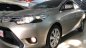 Toyota Vios 1.5 2014 - Cần bán xe Toyota Vios 1.5 sản xuất 2014, màu vàng như mới