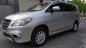 Toyota Innova E 2014 - Gia đình cần bán xe Innova E 2014, màu bạc