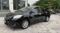 Toyota Vios   2011 - Cần bán Toyota Vios 2011, màu đen, số sàn
