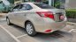 Toyota Vios 1.5E CVT 2017 - Cần bán lại xe Toyota Vios 1.5E CVT sản xuất 2017, màu nâu vàng